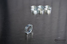 Prevost 1518 Treated Steel Double Ear Clamp Min/Max (In): 0.59-0.71