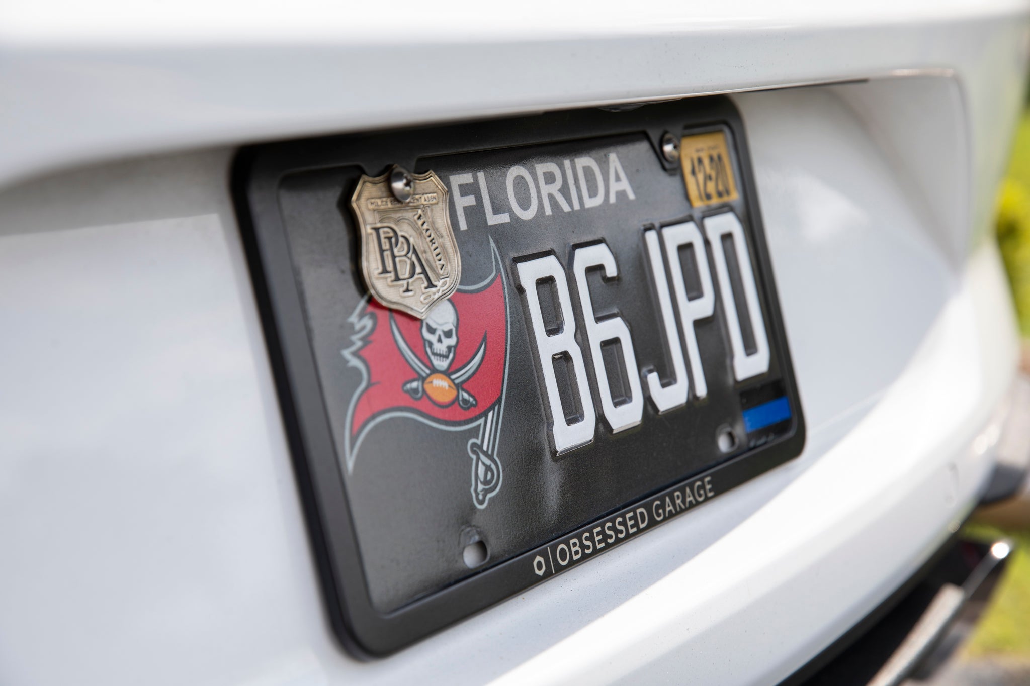 Premium Slim Plate Frames in Brushed Stainless Steel and Black